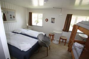 Postel nebo postele na pokoji v ubytování Hostel Rudbøl