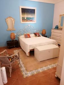 Postel nebo postele na pokoji v ubytování CASA MIA appartamento al centro