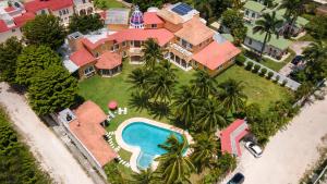 Photo de la galerie de l'établissement Orquideas Villas & Studios at Country House, à Cancún