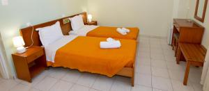 Voodi või voodid majutusasutuse Costa Hotel toas