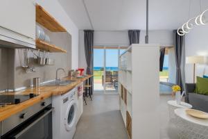 A kitchen or kitchenette at Niva Kamiros Apartments