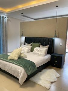 Ένα ή περισσότερα κρεβάτια σε δωμάτιο στο Exclusive Farm Getaway