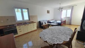 Kuchyň nebo kuchyňský kout v ubytování Apartment LANKA