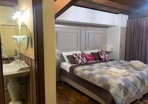 Posteľ alebo postele v izbe v ubytovaní B&B Villa del Sole Relais