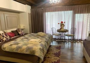 Posteľ alebo postele v izbe v ubytovaní B&B Villa del Sole Relais
