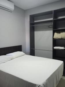 Postel nebo postele na pokoji v ubytování Vila Dumont no Centro de Foz