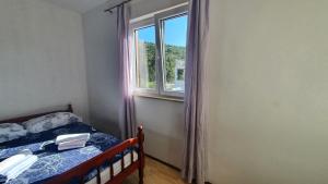 Postel nebo postele na pokoji v ubytování Apartment LANKA