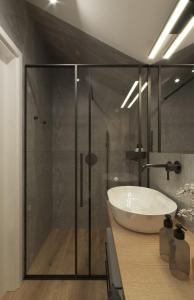 Phòng tắm tại Domki Gold-Time Niechorze