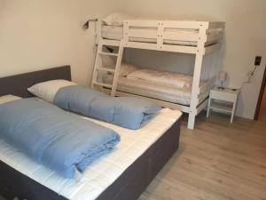 Posteľ alebo postele v izbe v ubytovaní Groot appartement in Aparthotel met prachtig uitzicht