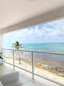 a balcony with a view of the ocean at Caribbean Island Hotel in San Andrés