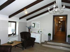 A seating area at Ferienwohnung 5 Bergschlössl Oberaudorf