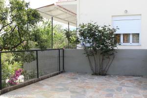 A balcony or terrace at Rentoulia Apartments
