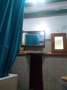 A television and/or entertainment centre at Bonita Casa Rural en la Sierra de Aracena Még 36 kép