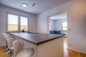 Fotografia z galérie ubytovania Apartamenty z widokiem - Willa KRÓLE 25A by RentiloPL v Zakopanom