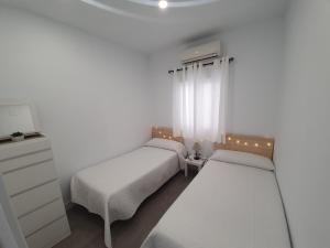 Uma cama ou camas num quarto em Brisas del mar