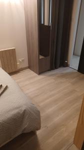Postel nebo postele na pokoji v ubytování Harmony