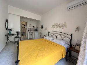 Postel nebo postele na pokoji v ubytování Naxos Philoxenia