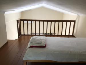 Posteľ alebo postele v izbe v ubytovaní Studio with loft Raxes Ikaria #5 + 16 fotografií