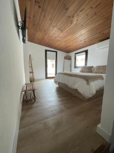 Postel nebo postele na pokoji v ubytování Carmela Apartment.