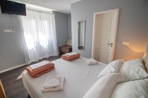 Postel nebo postele na pokoji v ubytování Villa M