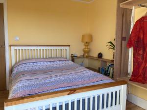 מיטה או מיטות בחדר ב-Highfields lodge