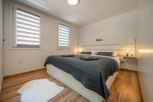 Postel nebo postele na pokoji v ubytování Mobile House Bojnice