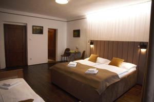 Voodi või voodid majutusasutuse Hotel Svambersky dum toas
