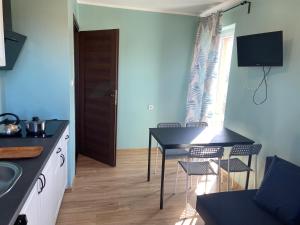 Kuchyň nebo kuchyňský kout v ubytování Pokoje Gościnne - Apartamenty MATI