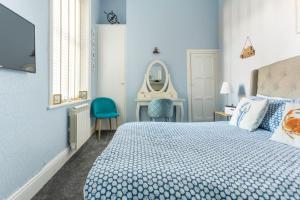 Кровать или кровати в номере Beach Retreat