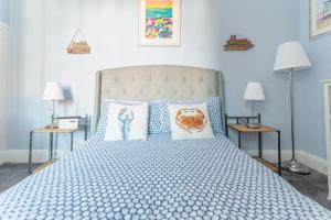 Кровать или кровати в номере Beach Retreat