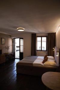 Voodi või voodid majutusasutuse Hotel Svambersky dum toas