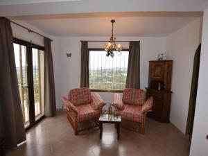 A seating area at Villa with private pool in Benitachell