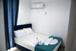 Katil atau katil-katil dalam bilik di Belek Gold Pansiyon
