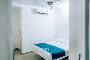 Postel nebo postele na pokoji v ubytování Neos Hotel Cartagena