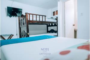 Postel nebo postele na pokoji v ubytování Neos Hotel Cartagena