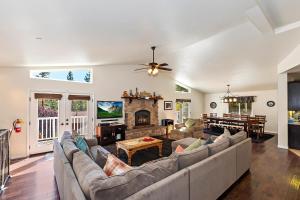 a living room with a couch and a fireplace at 040 - Bear Lake Retreat in Big Bear City