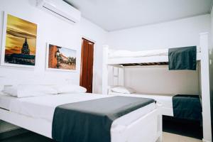 Postel nebo postele na pokoji v ubytování Neos Hotel Cartagena