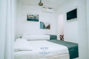 Postel nebo postele na pokoji v ubytování Neos Hotel Cartagena
