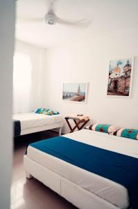 Postel nebo postele na pokoji v ubytování Neos Hotel Cartagena