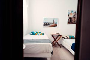 Postel nebo postele na pokoji v ubytování Neos Hotel Cartagena