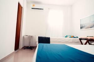 Postel nebo postele na pokoji v ubytování Neos Hotel Cartagena