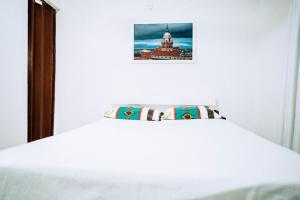Postel nebo postele na pokoji v ubytování Neos Hotel Cartagena