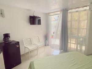 Μια τηλεόραση ή/και κέντρο ψυχαγωγίας στο Posada Vasquez Oviedo