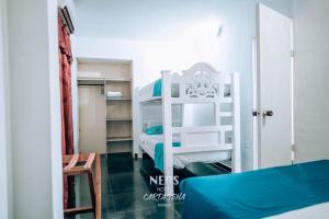 Postel nebo postele na pokoji v ubytování Neos Hotel Cartagena