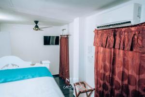 Postel nebo postele na pokoji v ubytování Neos Hotel Cartagena