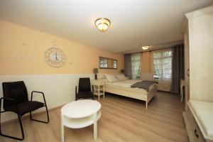 Postel nebo postele na pokoji v ubytování Liebezeit - ehemals Hotel Dillenburg