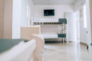 TV a/nebo společenská místnost v ubytování Neos Hotel Cartagena