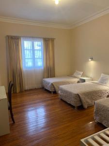 Katil atau katil-katil dalam bilik di Los Andes Bed & Breakfast