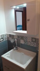Kúpeľňa v ubytovaní Pecciolo Port Apartaments