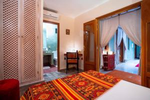 Vuode tai vuoteita majoituspaikassa Riad l'Heure d'Eté